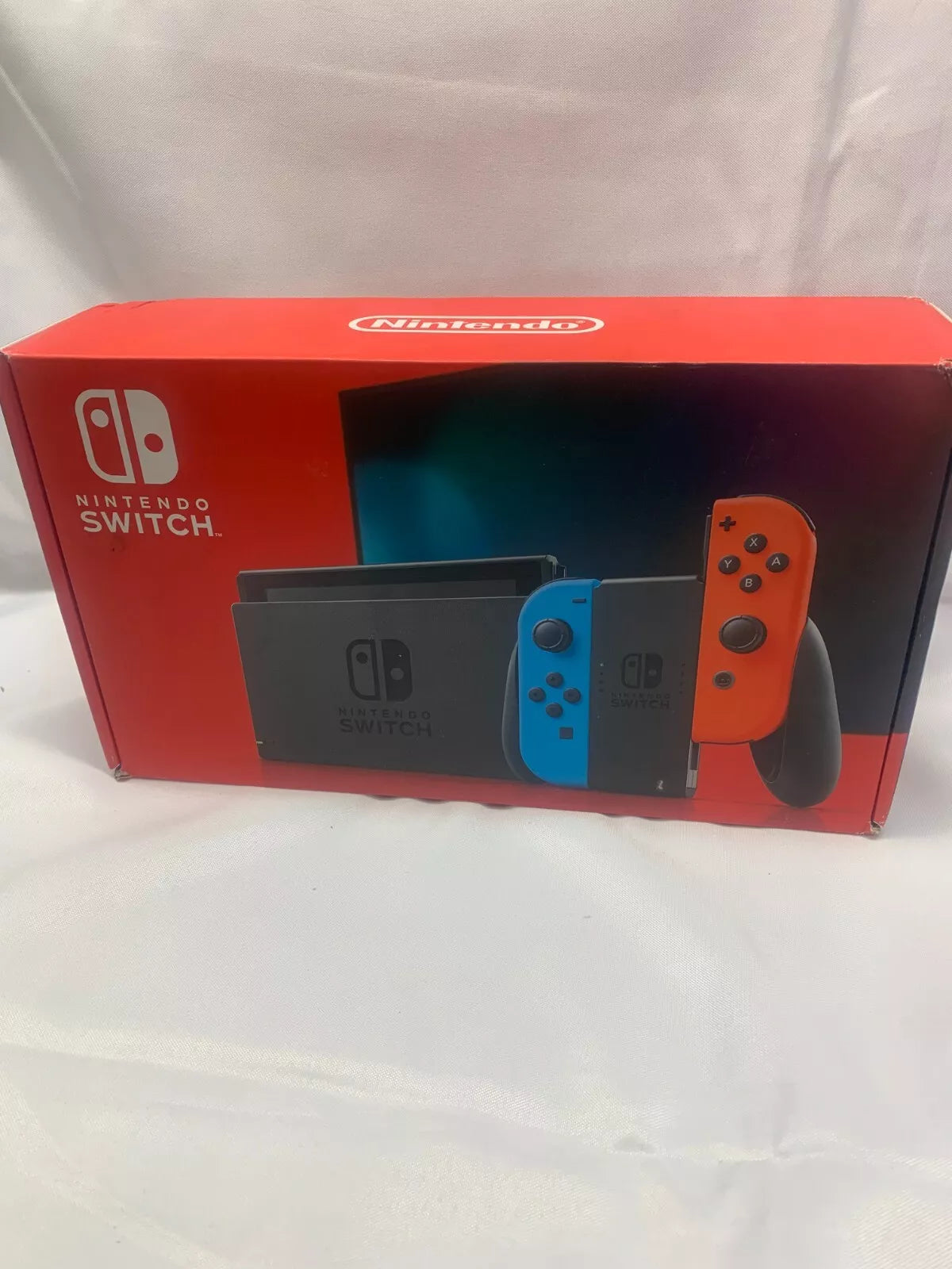 NINTENDO SWITCH AZUL/ROJO 32GB **CAJA DAÑADA**