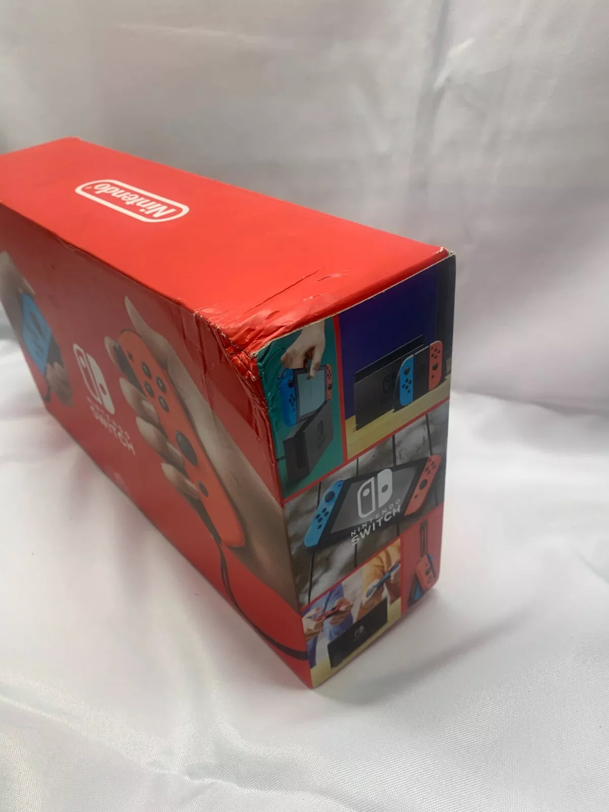 NINTENDO SWITCH AZUL/ROJO 32GB  **CAJA DAÑADA**